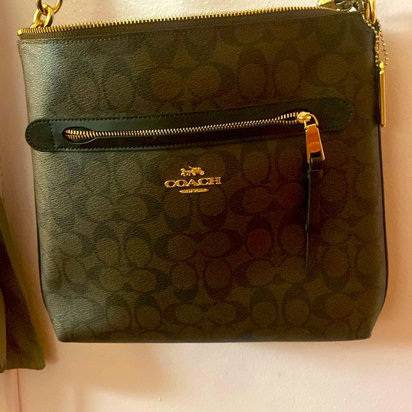 This is a brown and black coach satchel - Picture 1 of 7